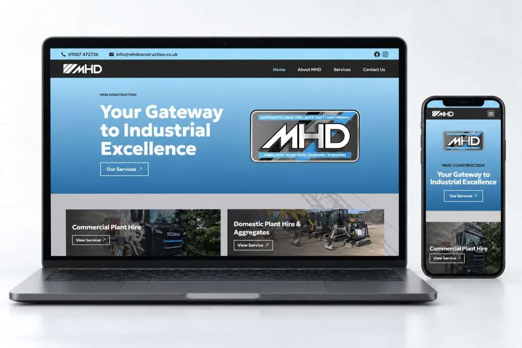 MHD Construction website with complete desktop hero on laptop and mobile