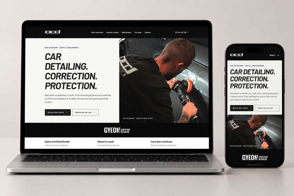OCD Autocare homepage shown on a laptop and smartphone with the complete detailing hero