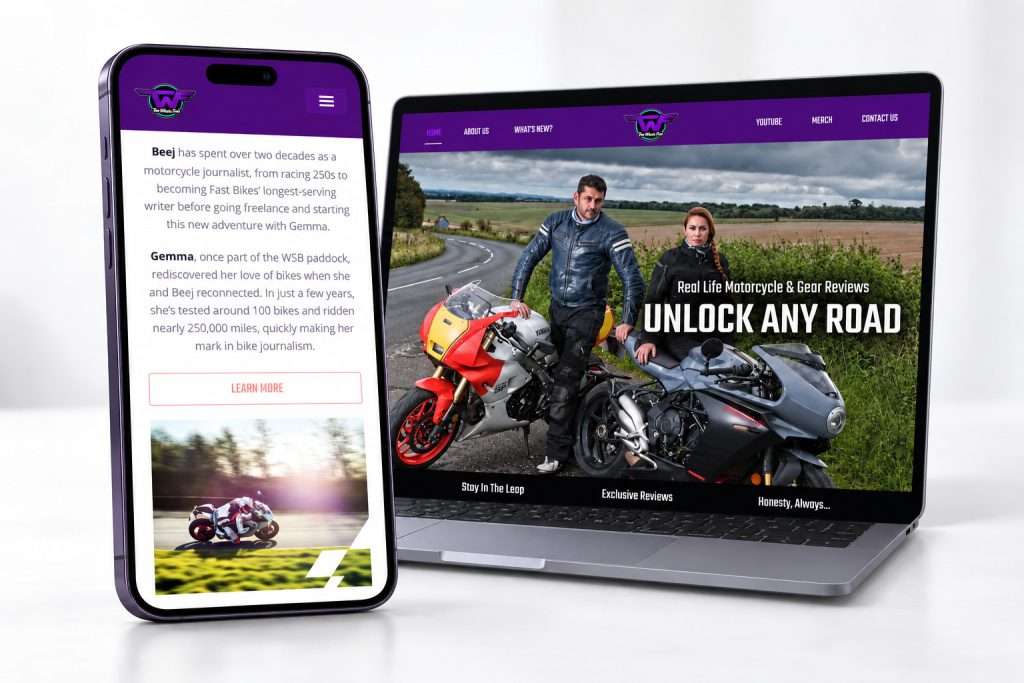 Two Wheels Feels responsive website with complete Unlock Any Road desktop hero, view 2